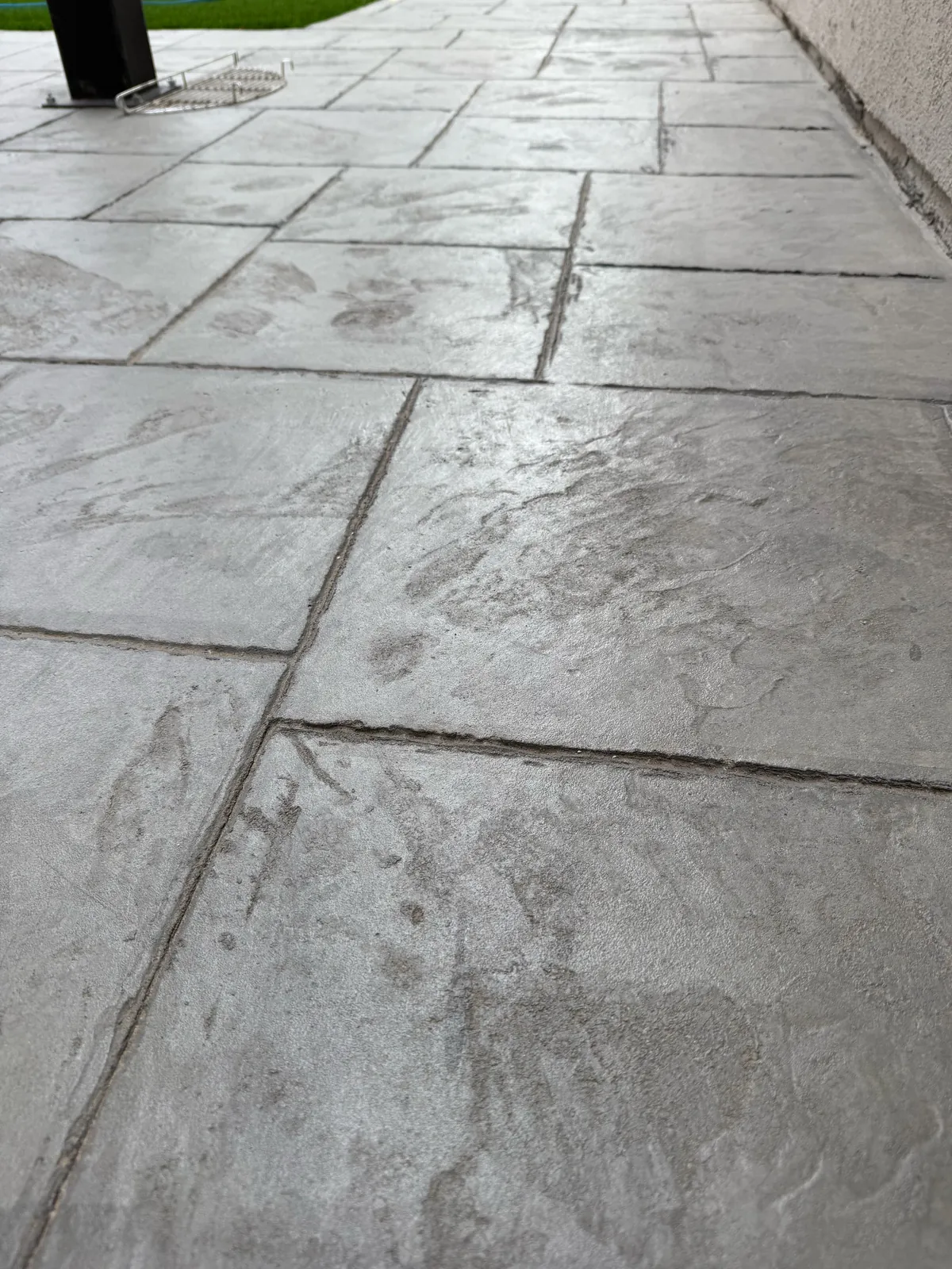 Stamped concrete finished to resemble large stone pavers, built by El Paso Elements